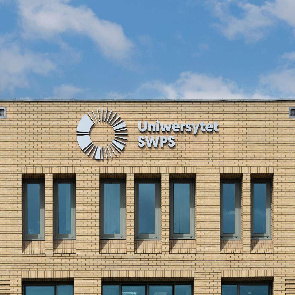 Logo and facade of SWPS Unviersity in Warsaw