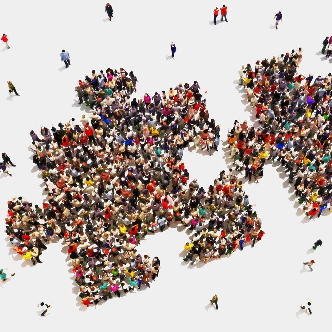 puzzle pieces made up of groups of people