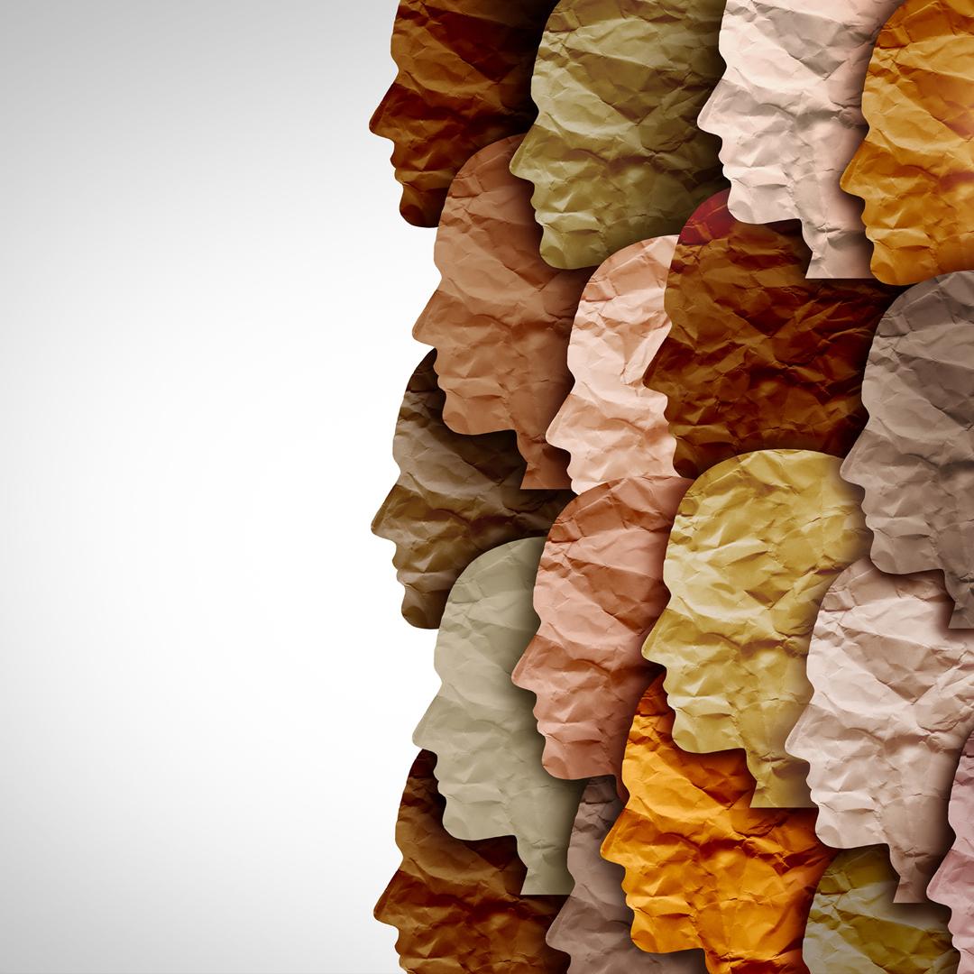 Concept photo faces made of various color crumpled paper grouped on right side