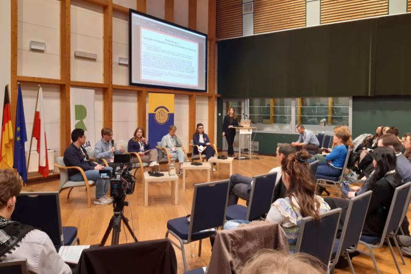 Group of students and academics attend workshop during conference