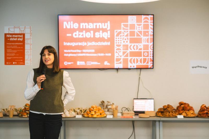 Zuzanna Jakubik, Sustainability Manager, speaks at the opening of the Food Sharing Corner at USWPS