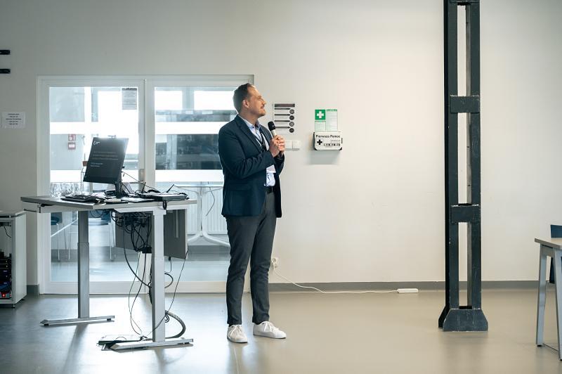 Radosław Stanczewski presents during a meeting at SWPS Unviersity