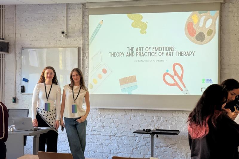 Two USWSP female students conduct a presentation during workshop 'The Art of Emotions" at USWPS in Katowice