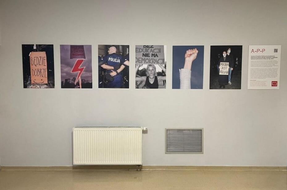 Six photos from various protests in Poland displayed on the corridor of SWPS University in Poznań