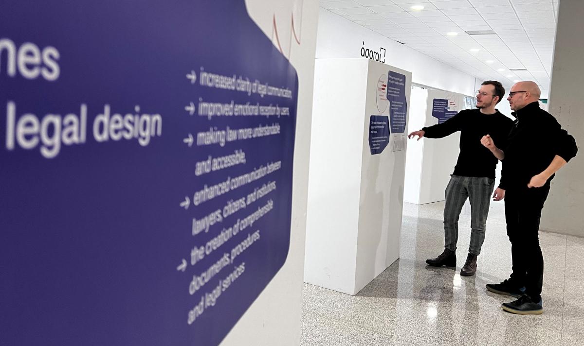 Mateusz Antczak and Tomasz Bierkowski from SWPS University viewing the exhibition at the University of Zaragoza