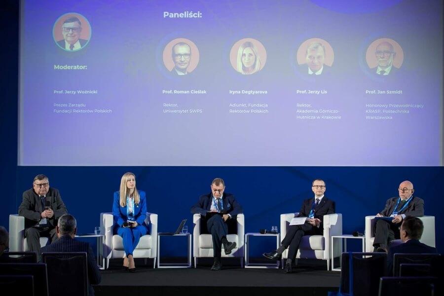 SWPS University Rector, Prof. Roman Cieślak, participating in a panel discussion with four other people at LUMEN 2023 Conference