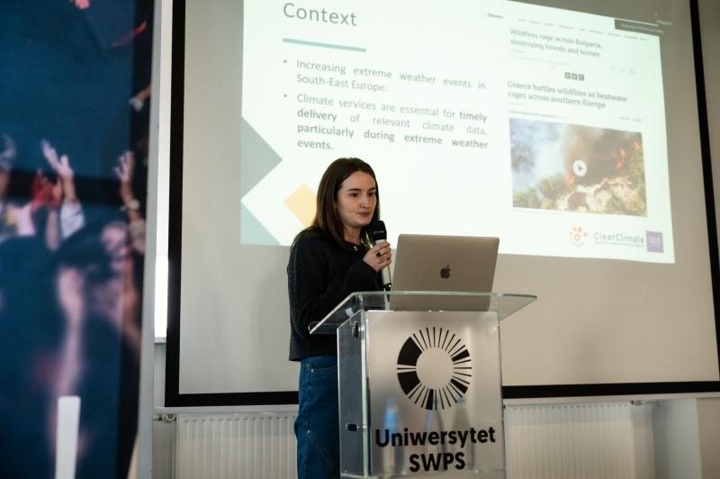 Woman speaking at Green Digital Accessibility conference 2025
