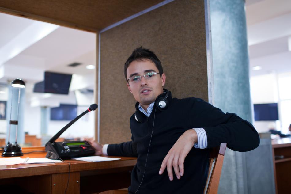 Interpreter in a translation booth