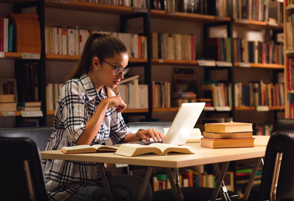 Literary researcher in a library